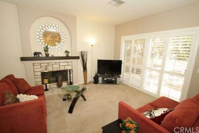 Living Room has a slider that opens to the lovely,