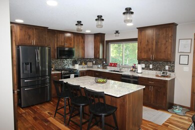 Beautiful, spacious kitchen with a large center island and custom woodwork..JPG