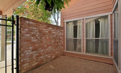 Adjacent to the front entry is a courtyard waiting
