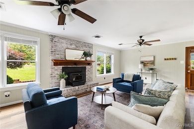 Cozy family room featuring wood stove fireplace.