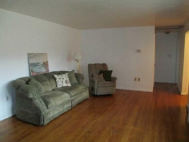Living Room. The hall leads to the three bedrooms!