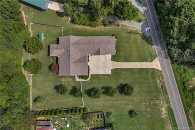 Property includes detached garage big enough for a