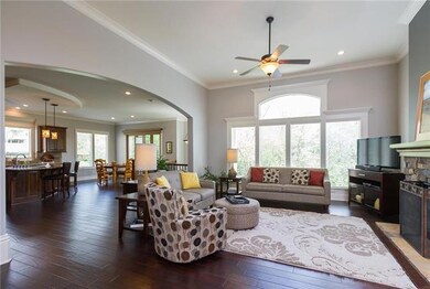 Open concept reverse 1.5 story has east sun in the