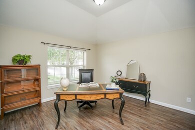 The executive study offers raised ceilings, and a large window with 2
