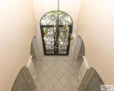 Front foyer with beautiful fixture.