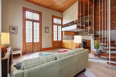 Living Room faces courtyard and french doors, with