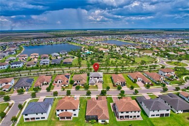 Aerial view of residential area with a large body
