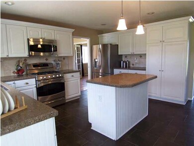 Notice the abundant cabinet and counter space.