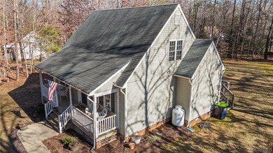 View of shed / structure with central AC and a por