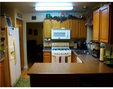 Kitchen. also has wood flooring