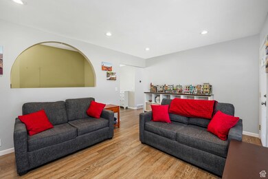 Living room featuring recessed lighting and wood finished floors