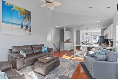 1102 Canal Drive B family to kitchen