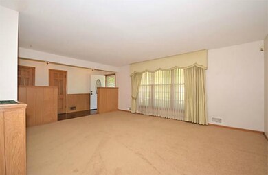 Formal Living Room w/carpet and excellent natural 
