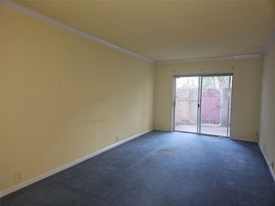 living room leading to private patio