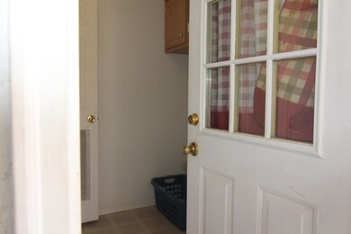 Laundry Off of carport entrance