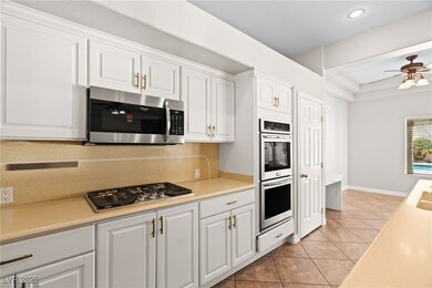 Kitchen featuring appliances with stainless steel