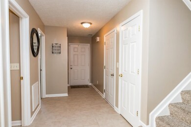 Greet your guests in the tiled foyer.