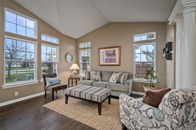 Vaulted ceiling and additional windows accent this