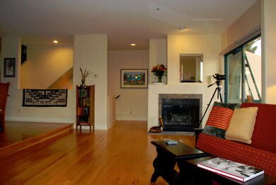 LIVING ROOM FIREPLACE AND HARDWOOD FLOOR