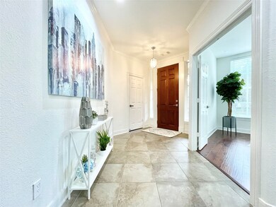 1st Floor entry with garage access, home office/guest room & private bath