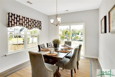 PICTURE IS OF COMPLETED MODEL HOME COLLINS PLAN - 