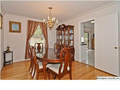 The dining room also opens to the kitchen.