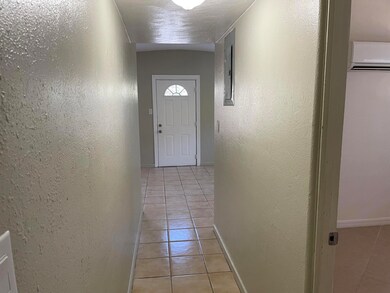Hallway to living room Paradise Lane