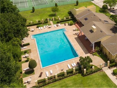 AERIAL VIEW OF SWIMMING POOL, TENNIS COURTS AND CL