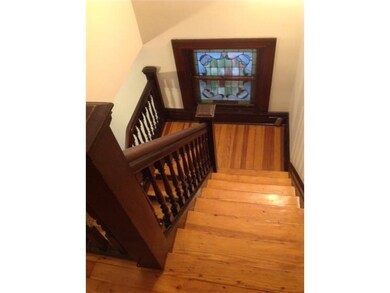 Other. Original stained glass in stairwell.