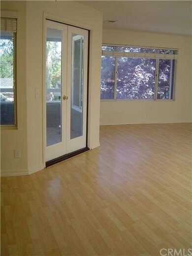 light and bright living room w/French door to balc