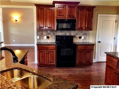 THE COOK WILL APPREICATE THE GRANITE COUNTERTOPS, THE SPACE TO PREPARE MEALS AND HOST GATHERINGS, A UTILITY CLOSET PLUS AN PANTRY FOR STORAGE!!