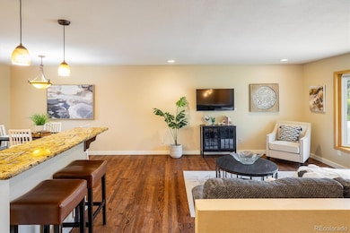 Living room open to kitchen and dining