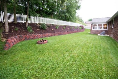 The rear yard has a new retaining wall as well as 