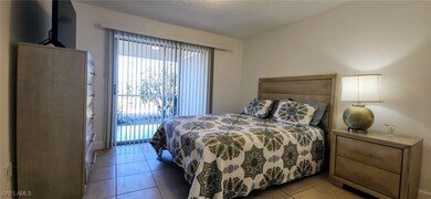 Bedroom with slider access to lanai