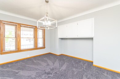 1st floor large dining room with new lighting fixture.