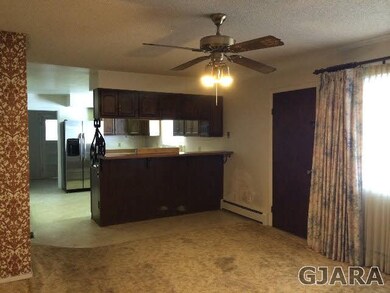 Formal and informal dining areas flow easily from 