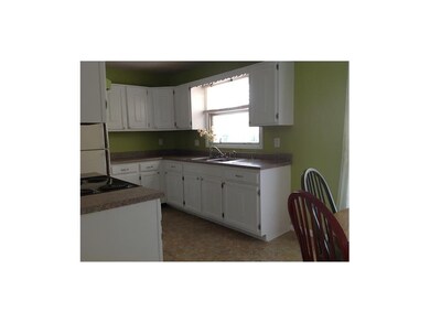 Newer flooring, countertops and faucet.