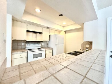open kitchen with lots of natural light and storag