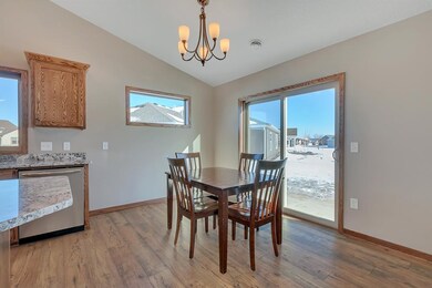 Dining room with glass slider to rear patio.