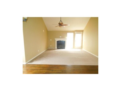 Large living room, fireplace, walk out to back pat