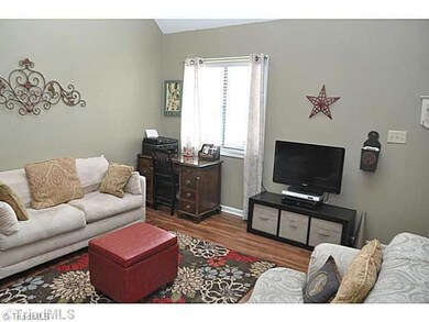 Living Room. Newer laminate floors for easy care, great natural light...