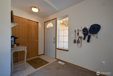 A large double coat closet is right as you enter the home. Ease and convenience for storing winter gear.