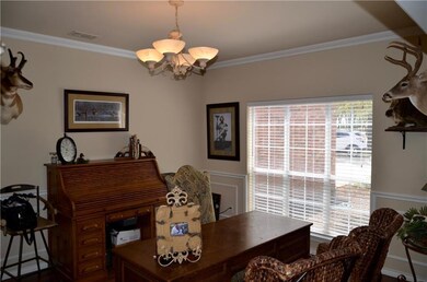 Formal dining is roomy enough for large table and 