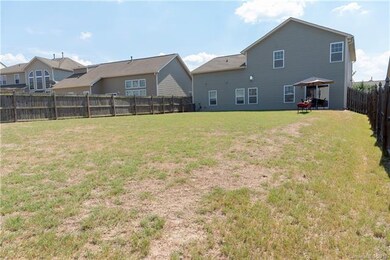 Huge, fenced backyard perfect for entertaining or 
