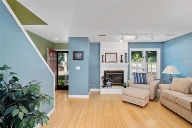Living room with wood-burning fireplace