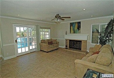 A large family room with a wood burning fire place