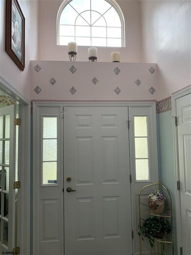 Two story foyer with tons of natural light!