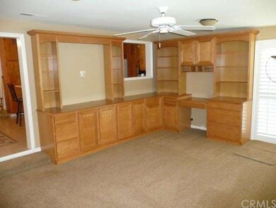 Built-in cabinetry in Add-on.  Ceiling fan, planta