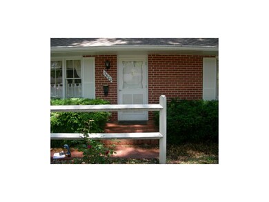 BRICK FRONT PORCH AND WALKWAY TO FRONT ENTRY