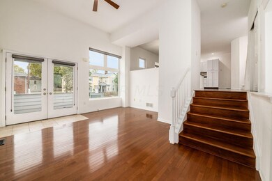 Living room leading to kitchen